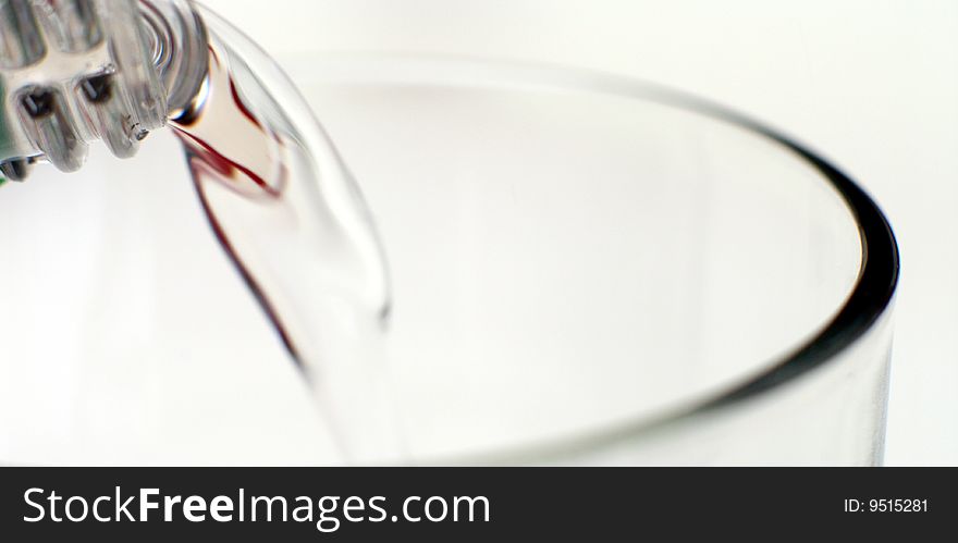 Pouring pure water into a glass