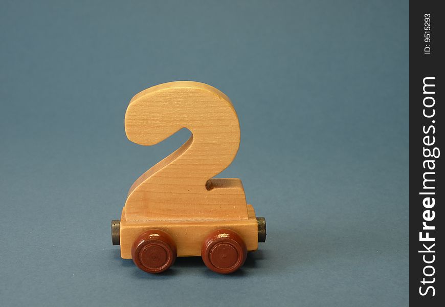 Wooden rating train, part , blue background. Wooden rating train, part , blue background