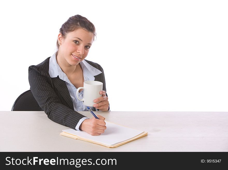 Business Woman Writing notes at desk isolated on white