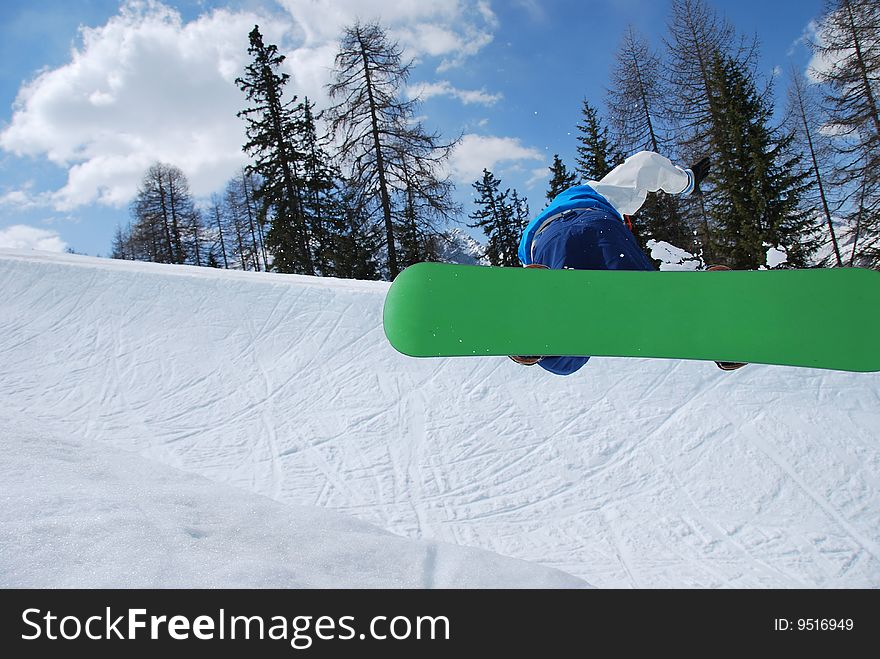 Snowboarder In Half Pipe