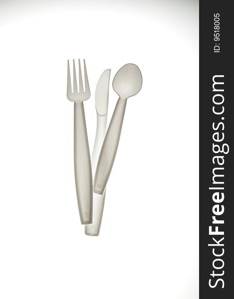 Plastic cutlery on a white background.