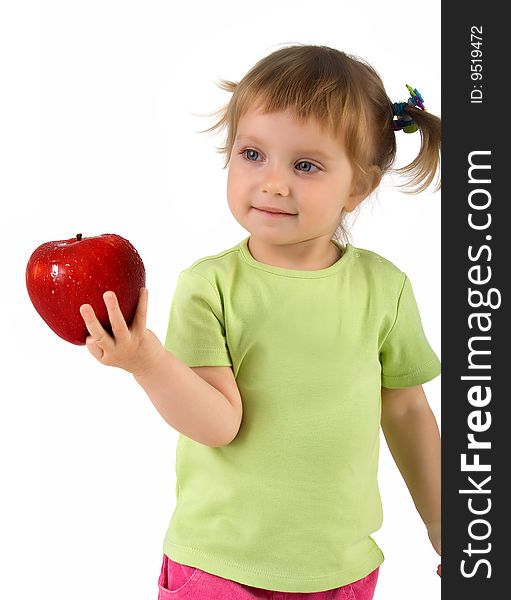 Little girl with red apple isolated on white background