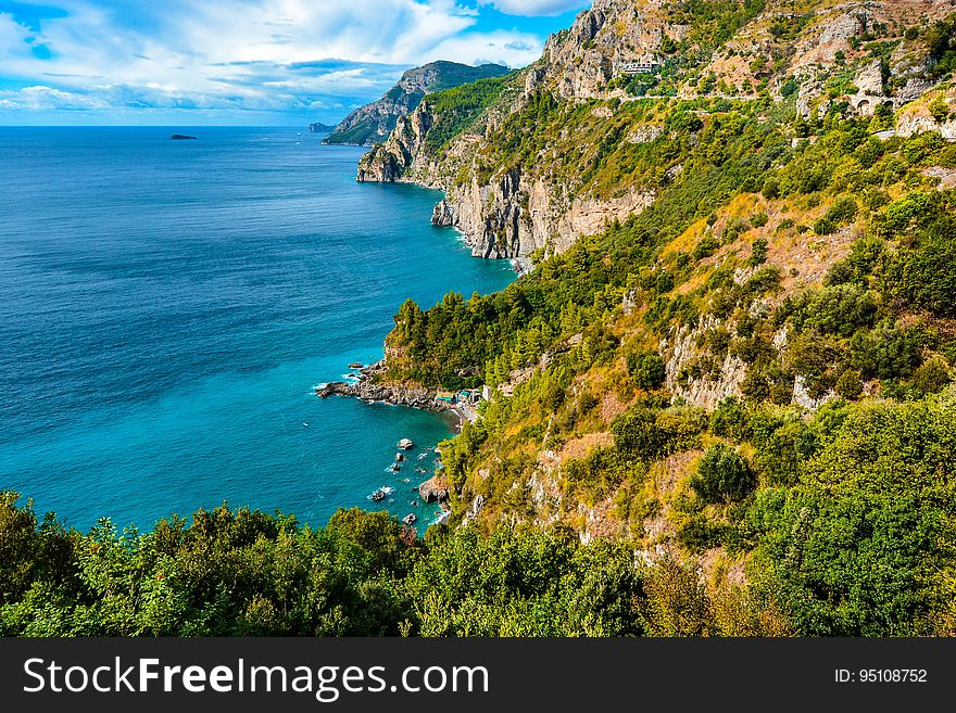 A view of a rocky coast and the sea.