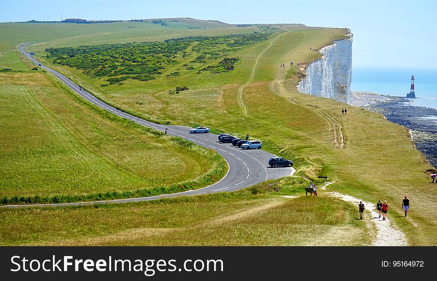 A view of the road alongside the coast and the White Cliffs of Dover.