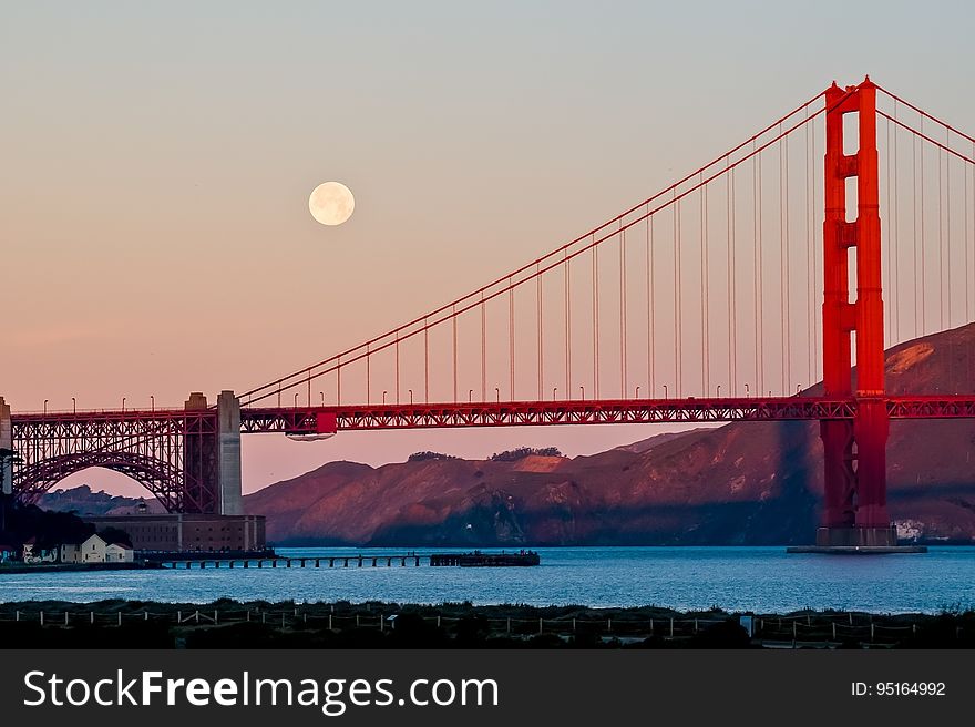 The Golden Gate bridge and the full moon.