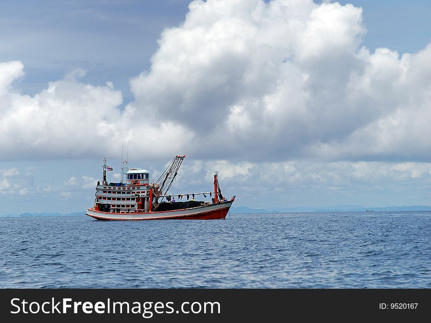 Ship Sailing in the Cloudy Andaman Sea Area