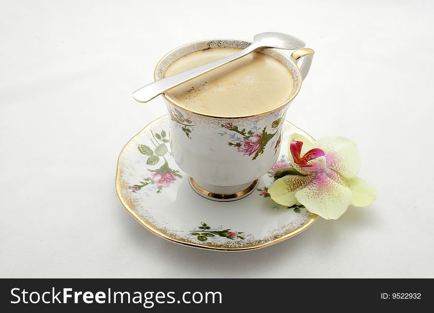 Cup of coffee on the neutral background