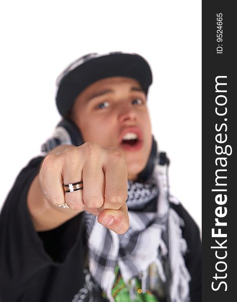 A young DJ is pointing at the camera and screaming. The focus is on his finger! Isolated over white. A young DJ is pointing at the camera and screaming. The focus is on his finger! Isolated over white.