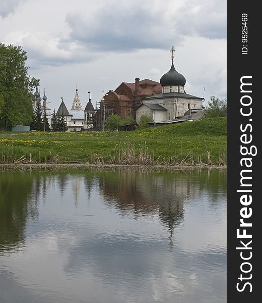 View of monastery of Archangel Michael in Yuryev-Polsky and Kaloksha river, Russia