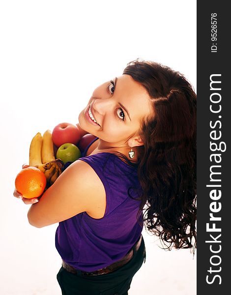 Young beautiful girl with fruit