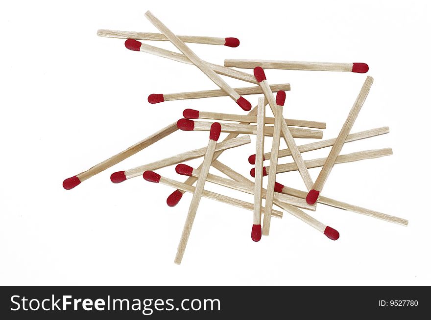 Scattered red tipped wooden matches array