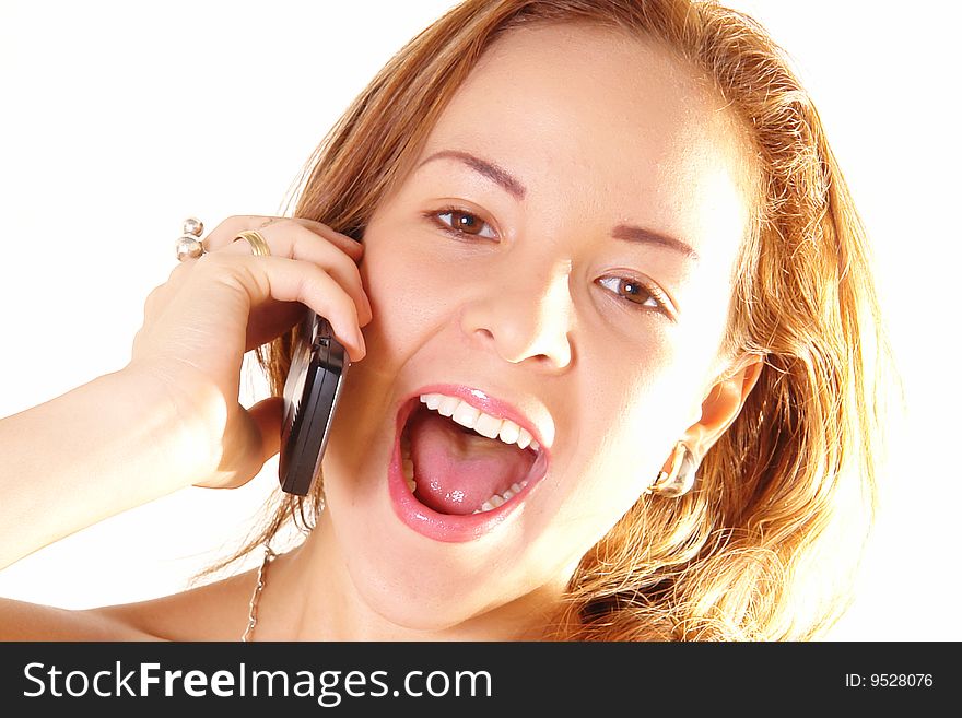 Happy woman talking by cellphone. Isolated image
