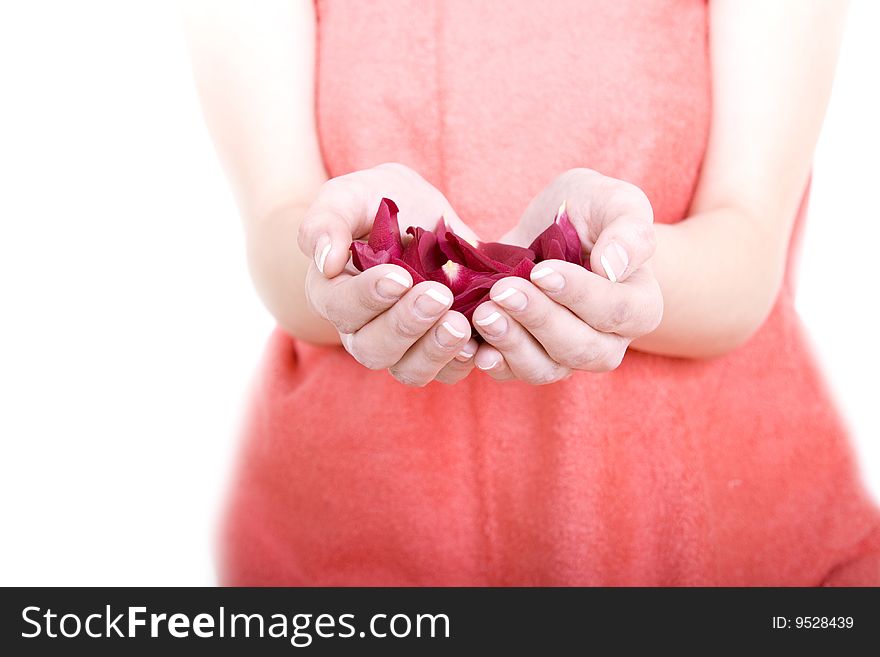 A young body keep in hands a petals of flowers. A young body keep in hands a petals of flowers