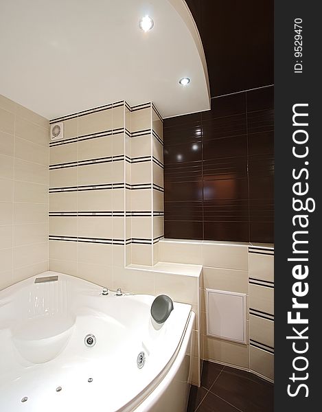 The beautiful modern bathroom finished with a tile