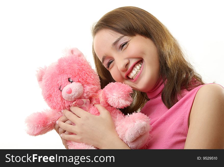 The girl with a pink teddy bear