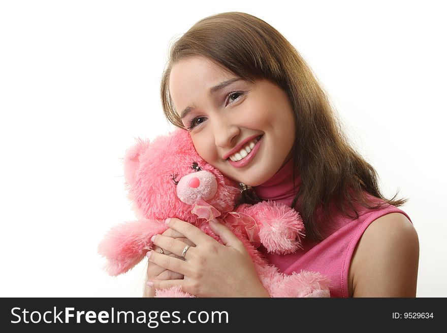 The girl with a pink teddy bear