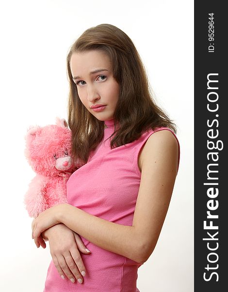 The girl with a pink teddy bear