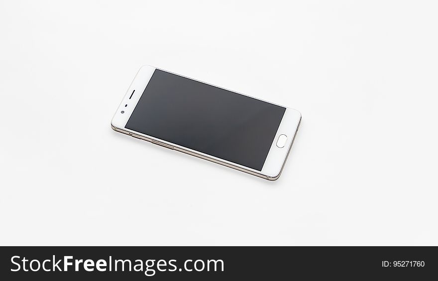 An android phone isolated on white. An android phone isolated on white.