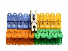 Multicolored Clothes-pegs And One Is Old Stock Images Multicolored Clothes-pegs And One Is Old Stock Images