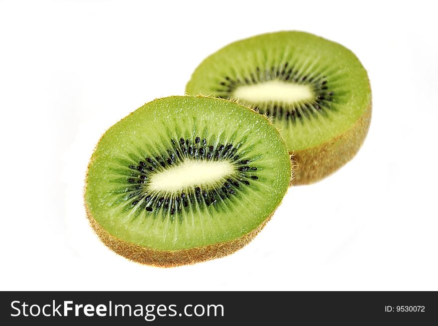 Slices of  kiwi isolated over white. Slices of  kiwi isolated over white.