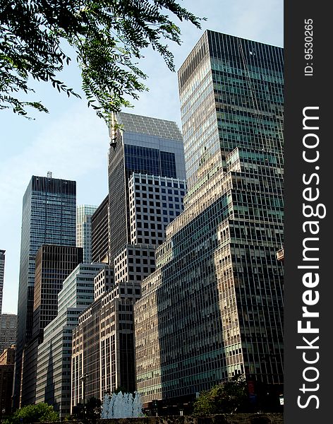 Contemporary architecture of glass and steel towers housing many major corporate headquarters line the west side of Park Avenue in the East 40's and 50's in Manhattan - Lee Snider Photo. Contemporary architecture of glass and steel towers housing many major corporate headquarters line the west side of Park Avenue in the East 40's and 50's in Manhattan - Lee Snider Photo.