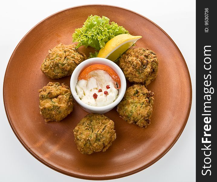 Traditional starter palte with fried marrows balls with garlic sauce. Traditional starter palte with fried marrows balls with garlic sauce