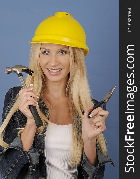 A young woman working in the construction industry. A young woman working in the construction industry