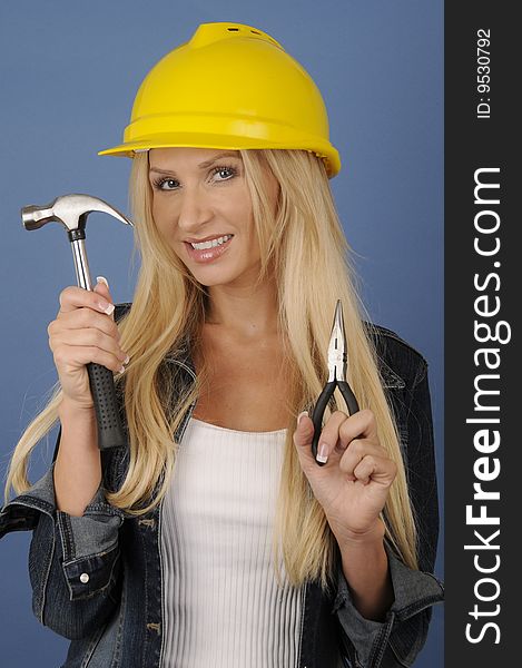 A young woman working in the construction industry. A young woman working in the construction industry