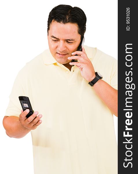 Mid adult man using a mobile phone isolated over white. Mid adult man using a mobile phone isolated over white