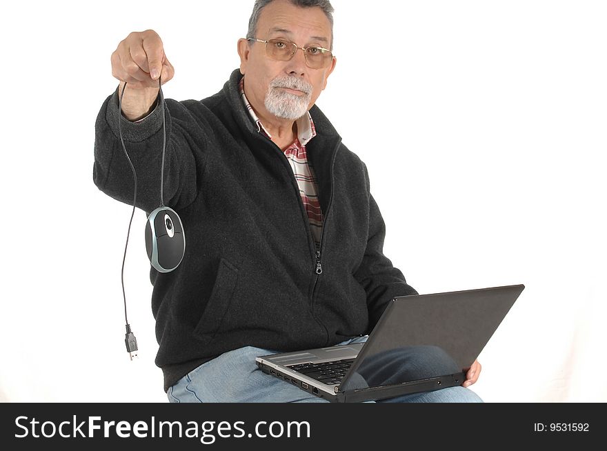 Senior showing a mouse with laptop computer isolated on white background