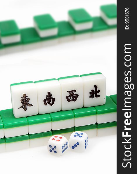 Here is a set of mahjong tiles. Mahjong tiles representing the four compass points in chinese. Here is a set of mahjong tiles. Mahjong tiles representing the four compass points in chinese.