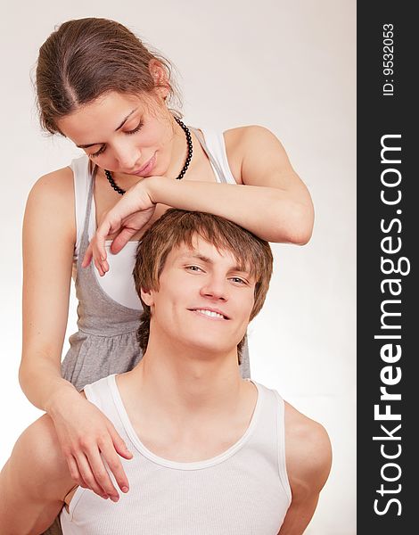 Young man and girl on white background