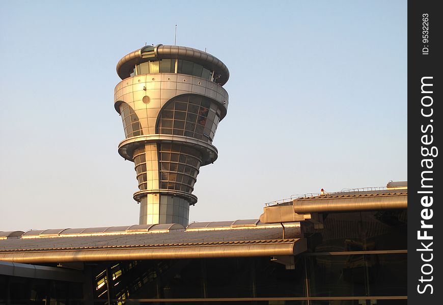 Air traffic control tower at a civil airport, pilots flight safety depend on it. Air traffic control tower at a civil airport, pilots flight safety depend on it.