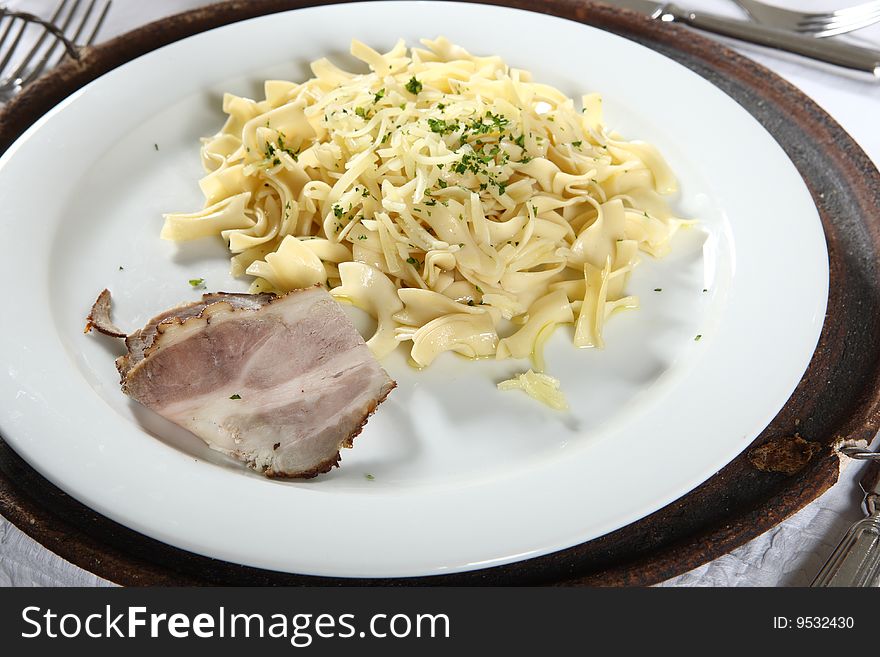 Fresh pasta with cheese and ham