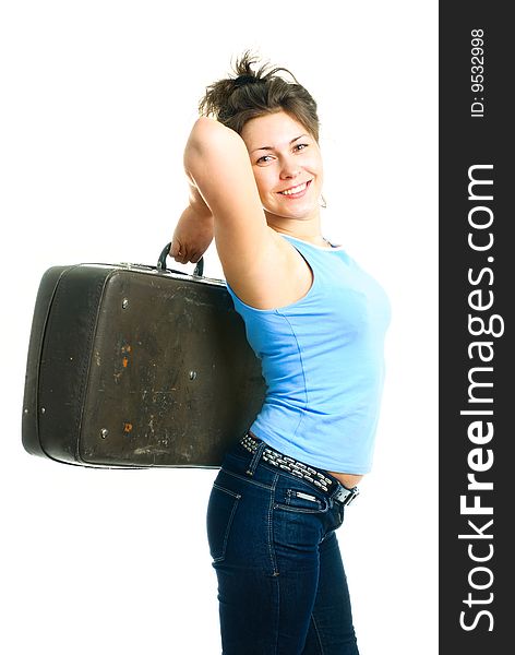 Portrait of a happy young beautiful woman with an old leather suitcase. Portrait of a happy young beautiful woman with an old leather suitcase