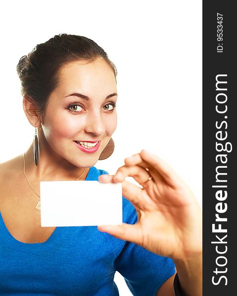 Young cheerful businesswoman showing us a business card (focus on the woman). Young cheerful businesswoman showing us a business card (focus on the woman)
