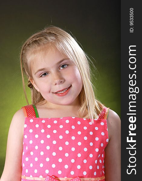 A childs portrait on a black background. A childs portrait on a black background