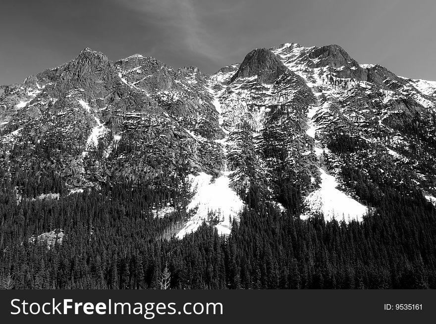 Snow melting from the mountains of the North Cascades range in Summer. Snow melting from the mountains of the North Cascades range in Summer