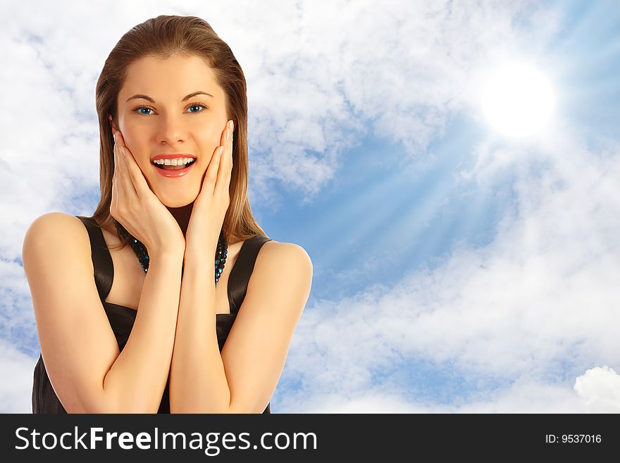 Beautiful Girl Against The Blue Sky With Clouds