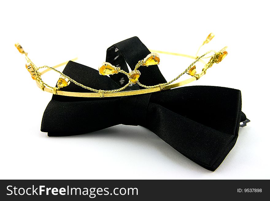 Single Black Bow Tie with Tiara on a white Background. Single Black Bow Tie with Tiara on a white Background