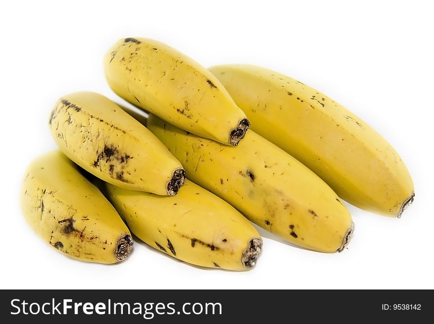 Bunch of yellow bananas with black spots
buscar