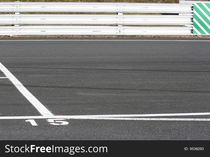 The front marker of the grid at the Oulton Park motor racing circuit in Cheshire, UK. The front marker of the grid at the Oulton Park motor racing circuit in Cheshire, UK.