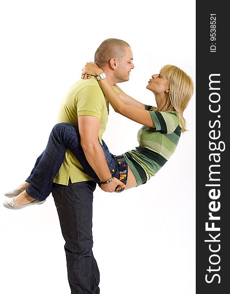 Man holding his girlfriend in the air