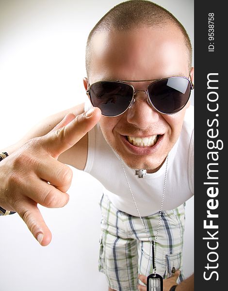 Dynamic picture of a casual young man screaming