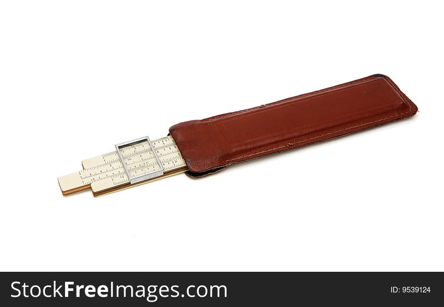 Old pocket slide rule in leather case isolated
