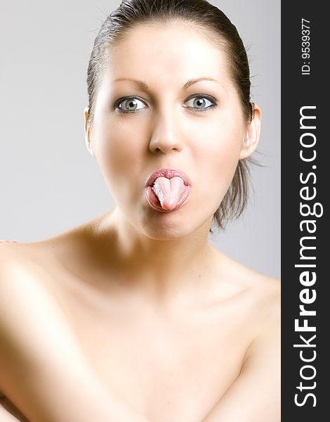 Closeup of a woman s face - tongue out