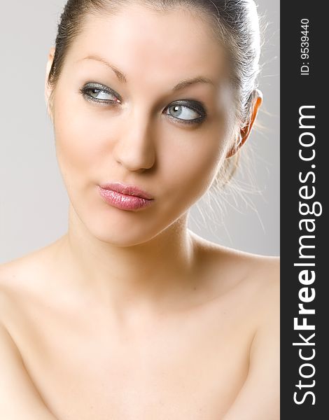 Closeup of an attractive woman\'s face - looking at her right side. Closeup of an attractive woman\'s face - looking at her right side