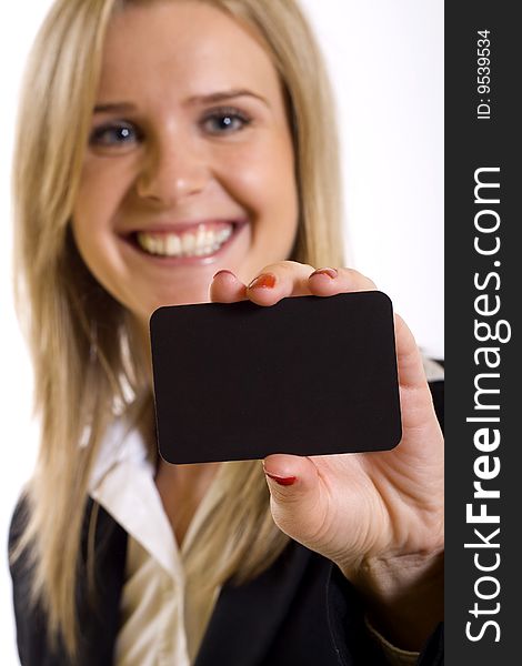 Closeup of an attractive business woman holding a blank card. Closeup of an attractive business woman holding a blank card