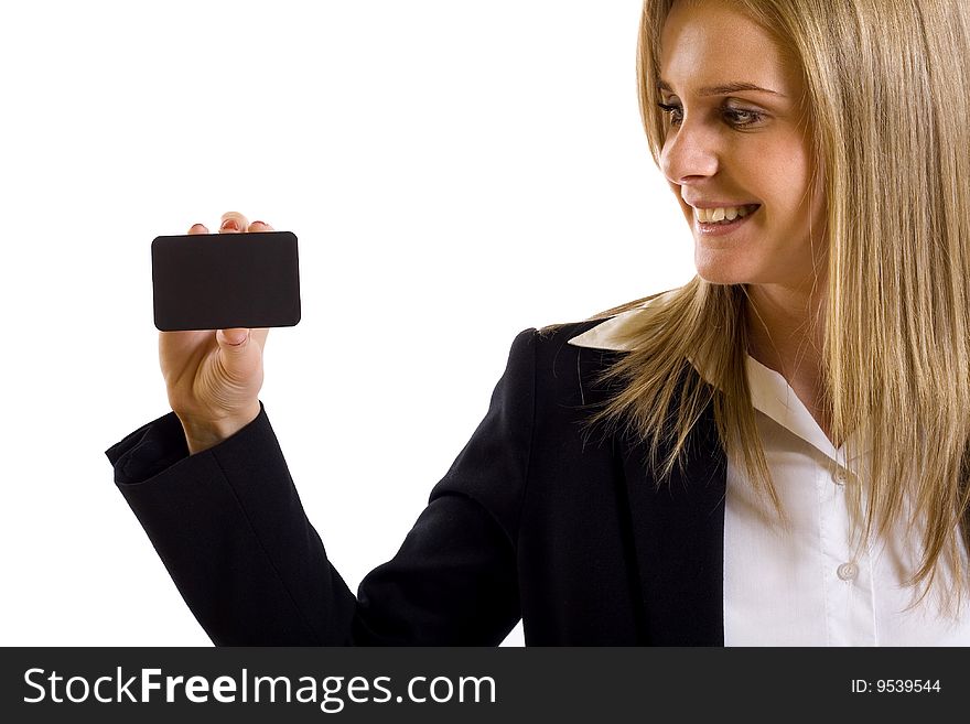 Attractive businesswoman holding a blank card and looking at it