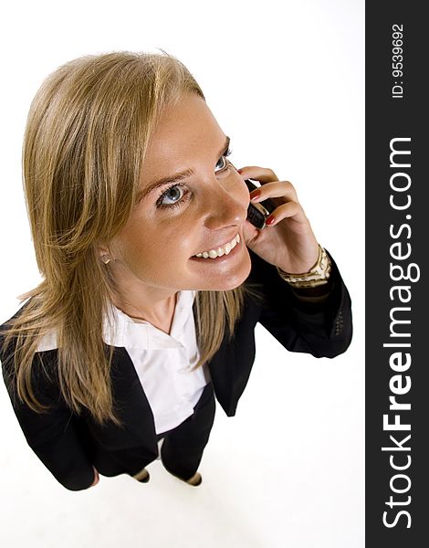 Wide angle picture of an attractive businesswoman on the phone